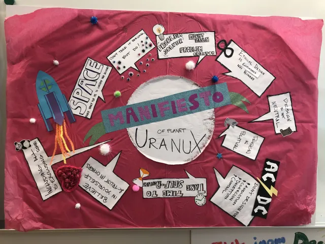 “Manifesto of Planet Uranux”: A student manifesto on pink tissue paper with a rocket and speech bubbles: “Design is not neutral”, “Ethical design is continuous, not binary”, “Problem solver might mean problem creator”, “Don't design for addiction, deception or control”, “Make space for yourself to consider your decisions”.